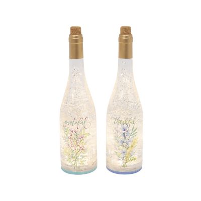 Gerson International Battery-Operated Lighted Spinning Water Globe Bottle with Gathered Greens Design and Timer, 12.5 in., 2 pc.