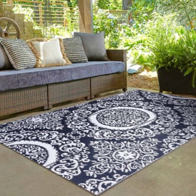 Image showing  Polypropylene Indoor/Outdoor Tribal Inspired Floral Area Rug, 5.3 x 7.3ft.