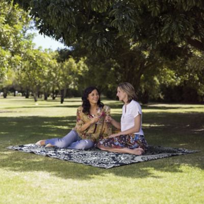 Image showing  Polypropylene Indoor/Outdoor Tribal Inspired Floral Area Rug, 5.3 x 7.3ft.