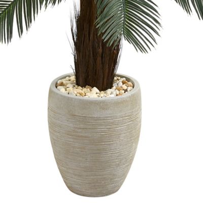 Image showing  4.5 ft. Artificial Indoor/Outdoor UV-Resistant Cycas Tree in Oval Planter