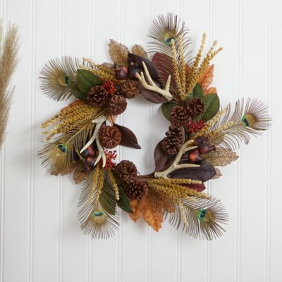 Image showing  27 in. Magnolia Leaf, Berry, Antler and Peacock Feather Artificial Wreath