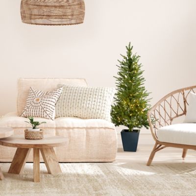 Image showing  4.5 ft. Faux Christmas Tree with Clear Lights in Decorative Planter