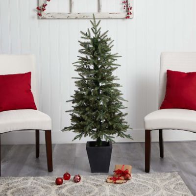 Image showing  4.5 ft. Faux Christmas Tree with Clear Lights in Decorative Planter