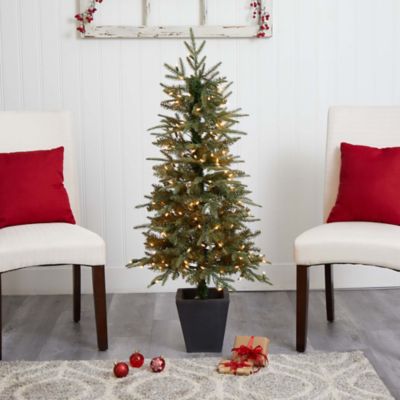 Image showing  4.5 ft. Faux Christmas Tree with Clear Lights in Decorative Planter