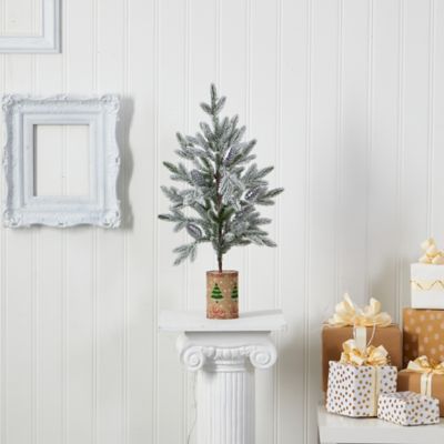 Image showing  28 in. Flocked Artificial Christmas Tree in Decorative Planter