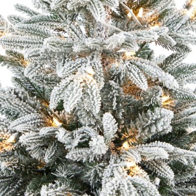 Image showing  5 ft. Flocked Manchester Spruce Artificial Christmas Tree in Red Tower Planter