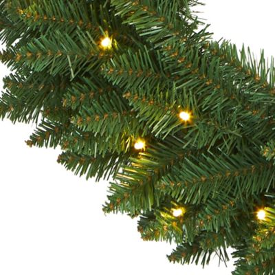 Image showing  24 in. Pre-Lit Green Pine Artificial Christmas Wreath, Clear LED Lights