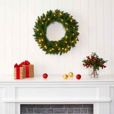 Image showing  24 in. Pre-Lit Green Pine Artificial Christmas Wreath, Clear LED Lights