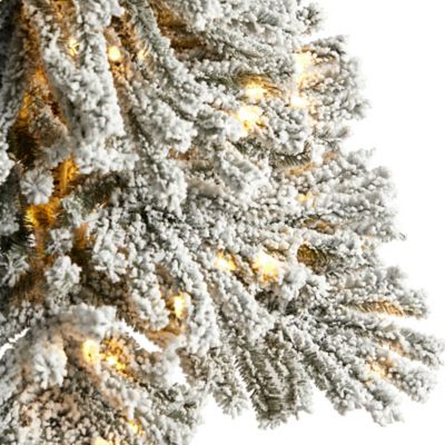 Image showing  5 ft. Winter Flocked Leaning Artificial Christmas Tree with LED Lights in Decorative Planter