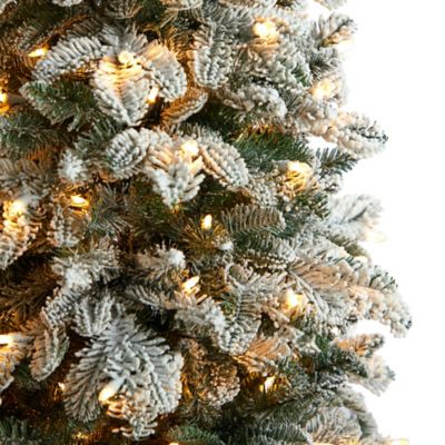 Image showing  5 ft. Flocked North Carolina Fir Artificial Christmas Tree with Warm White Lights and Bendable Branches
