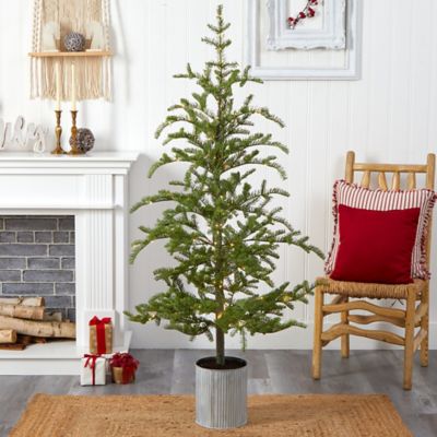 Image showing  5.5 ft. Pine Artificial Christmas Tree with Lights in Decorative Planter