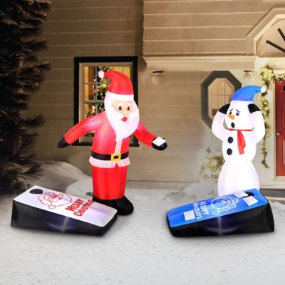 Image showing  Outdoor Inflatable Santa and Snowman Playing Cornhole