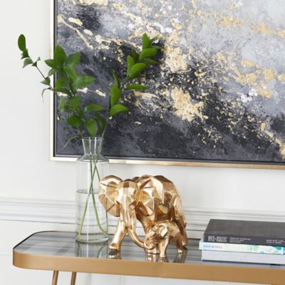 Cosmoliving by Cosmopolitan Gold Resin Modern Elephants Sculpture, 7 in. x 10 in. x 8 in.