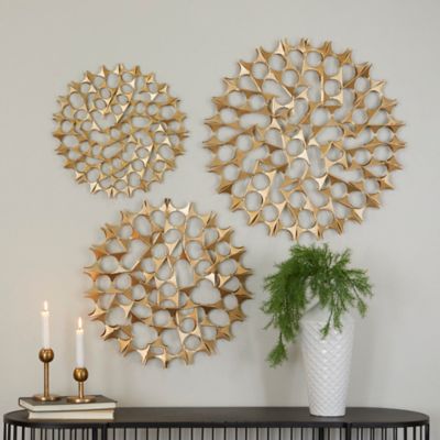 Harper & Willow Gold Metal Starburst Wall Decor with Cutout Design, 15 in. x 19 in. x 23 in., 3 pc.