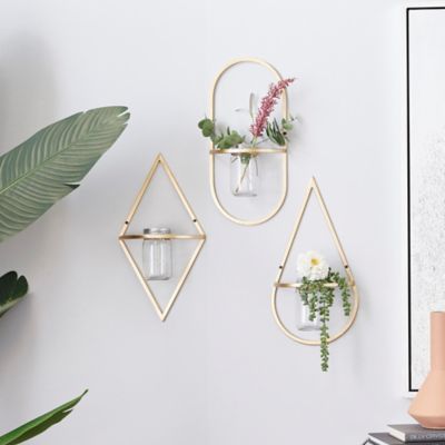 Cosmoliving by Cosmopolitan Gold Metal Glam Shapes and Symbols Wall Decor, 3 pc.