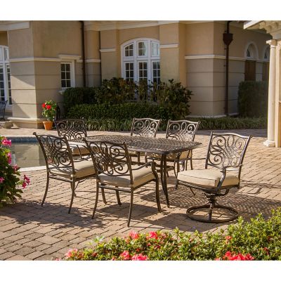 Image showing  Seasons 7-Piece Outdoor Dining Set in Tan with Four Dining Chairs, Two Swivel Chairs and a 38 x 72 in. Table