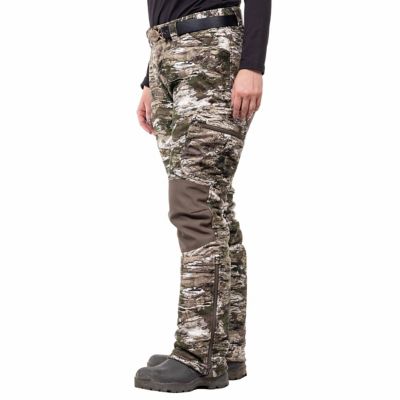 Image showing  Women's Classic Fit Mid-Rise Ketchikan Heavyweight Windproof Softshell Lined Hunting Pants, Tarnen Camo