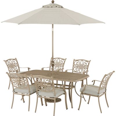 Hanover Traditions 7 pc. Dining Set with 6 Stationary Chairs, 38 in. x 72 in. Table, 9 ft. Umbrella, and Stand, Sand Finish -  TRADDNS7PC-BE-SU