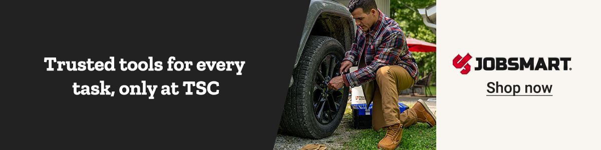 A toolbox and a man changing a tire