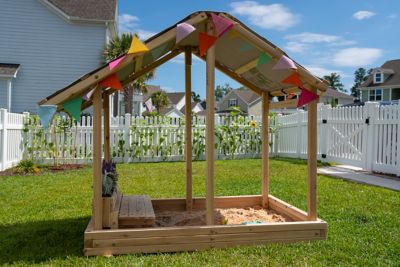 Image showing  Dig N' Play Wooden Sandbox Playhouse with Bench & Flower Planter, Outdoor Sand Pit for Kids