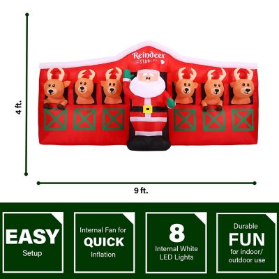 Image showing  4 ft. Pre-Lit Inflatable Santa in Reindeer Stable Christmas Decoration