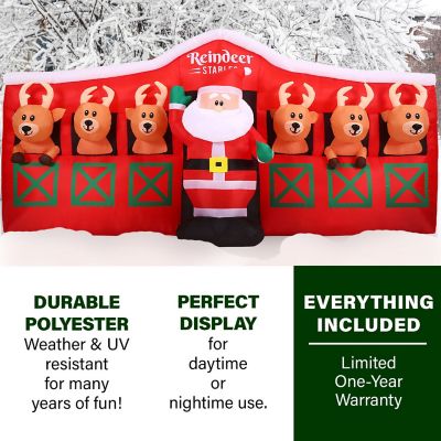 Image showing  4 ft. Pre-Lit Inflatable Santa in Reindeer Stable Christmas Decoration