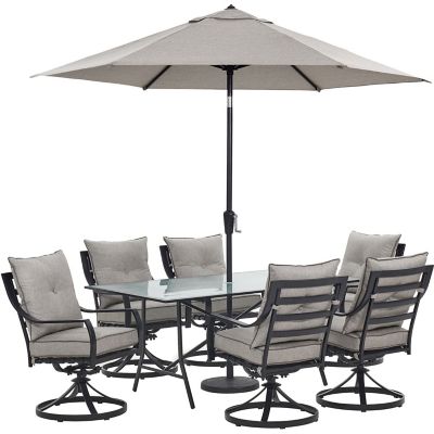 Cambridge Lawrence 7Piece Dining Set in Silver Linings with 6 Swivel Rockers, 66 x 38 in. Glass-Top Table, Umbrella, Base