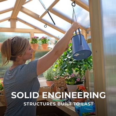 Image showing  6.7 ft. L x 9.7 ft. W Natural Cedar Meridian Greenhouse