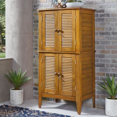 homestyles 30 lb. Maho Brown Acacia Wood Outdoor Storage Cabinet