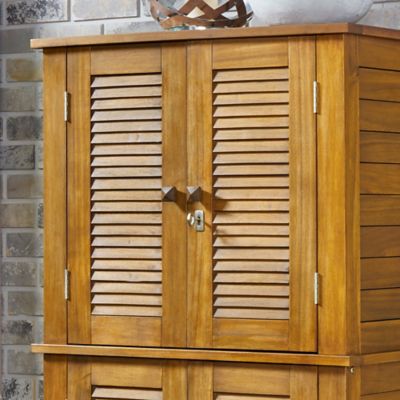 Image showing 6 th homestyles 30 lb. Maho Brown Acacia Wood Outdoor Storage Cabinet