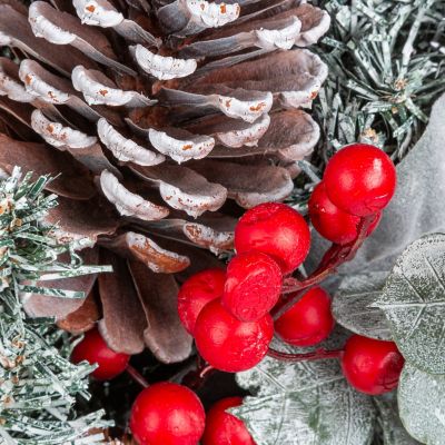 Image showing  24 in. Snowy Pine Christmas Wreath with Red Berries Cone and Red Bow