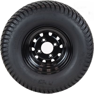 Image showing  22 x 11-10 4PR on 10 x 7 4-Lug Black Rim L&G Tire Assembly