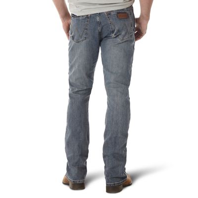 Image showing 1 th Wrangler Men's Slim Fit Low-Rise Retro Bootcut Jeans