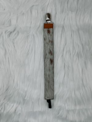 The Whole Herd Brown & White Cowhide Baby Paci Clip