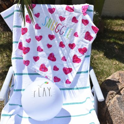 Image showing  Snuggle Kids Hooded Towel & 12 in. Beach Ball - Hearts 48 in. x 24 in. Poncho
