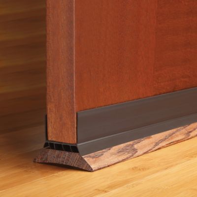 Image showing  1-3/4 in. x 2 in. x 36 in. Vinyl Easy Install DENY Slide-on Under Door Seal, Brown