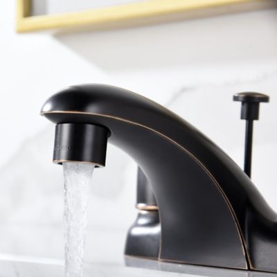 Image showing  Vantage 4 in. Centerset 2-Handle Bathroom Lavatory Faucet Rust Resist with Drain Assembly in Oil Rubbed Bronze