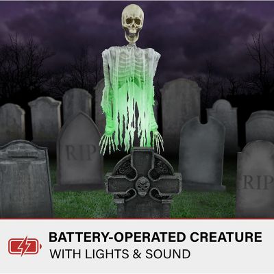 Image showing  69 in. Floating Skeleton Ghost Over Tombstone by Tekky Halloween Animatronic