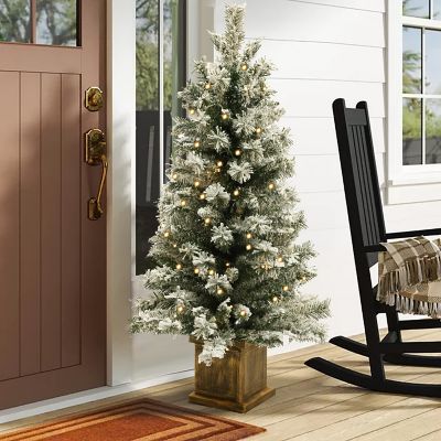 Image showing  4 ft. Pre-Lit LED Battery-Operated with Timer Artificial Flocked Fir Christmas Tree with Square Planter