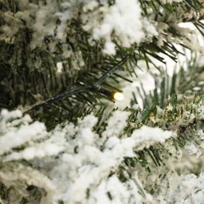 Image showing 7 th LuxenHome 4 ft. Pre-Lit LED Battery-Operated with Timer Artificial Flocked Fir Christmas Tree with Square Planter