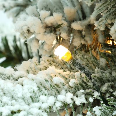 Image showing 5 th LuxenHome 4 ft. Pre-Lit Snow-Flocked Potted Artificial Christmas Tree