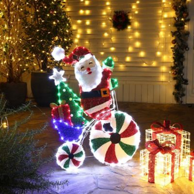 LuxenHome Santa on Peppermint Bike Lighted Holiday Decoration