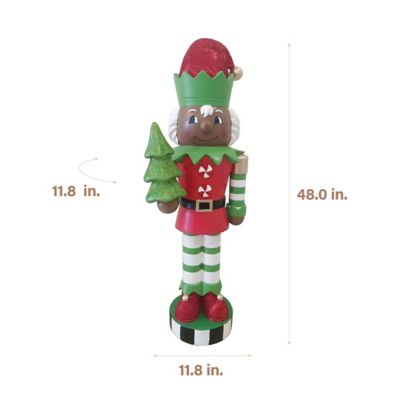 Image showing  48 in. African American Elf Nutcracker Figurine Holding Tree in Red/Green