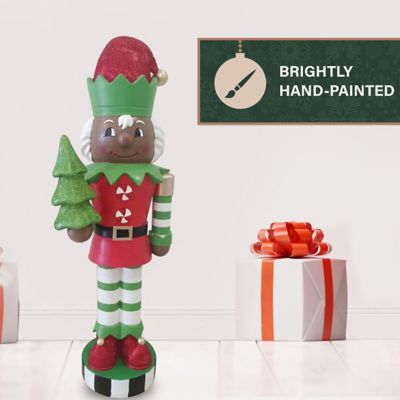 Image showing  36 in. African American Elf Nutcracker Figurine Holding Tree in Red/Green