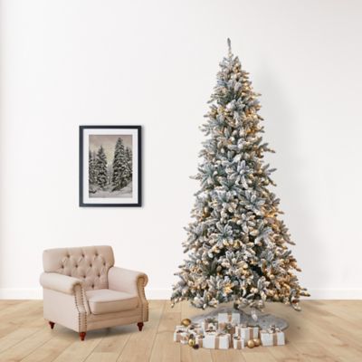 Image showing  10 ft. Prelit Flocked Livingston Fir Artificial Christmas Tree with Pine Cones