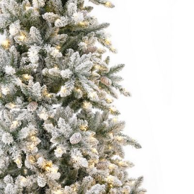 Image showing  10 ft. Prelit Flocked Livingston Fir Artificial Christmas Tree with Pine Cones