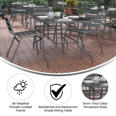 Image showing  Tory 31.5 in. x 55 in. Rectangular Tempered Glass Metal Table with Umbrella Hole