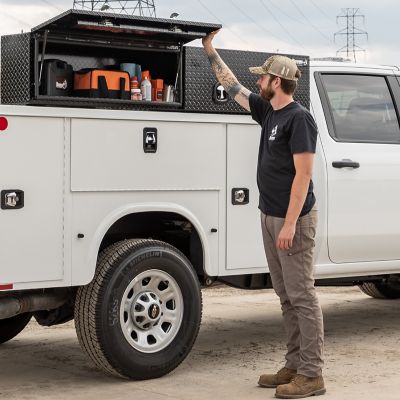 Image showing 8 th Buyers Products 18 x 16 x 72in. Matte Black Diamond Tread Aluminum Topsider Truck Box with Flip-Up Doors