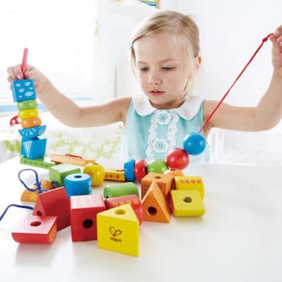 Image showing 3 th Hape String-Along Shapes - 32 pc. Classic Wooden Block Stacking Game
