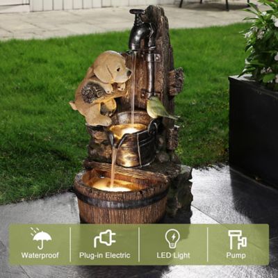 Image showing 8 th LuxenHome Puppy at the Farmhouse Faucet Resin Outdoor Fountain with Lights